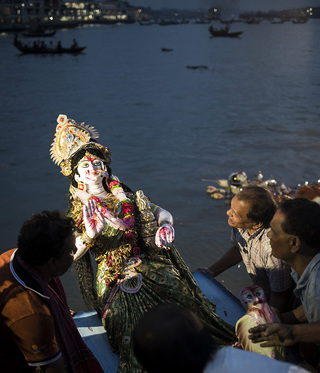 During the Durga Puja celebrations the inhabitants carried a Durga goddess statue from their colony to the Buriganga river. There they went out on the river by a boat to sacrifice the statue.